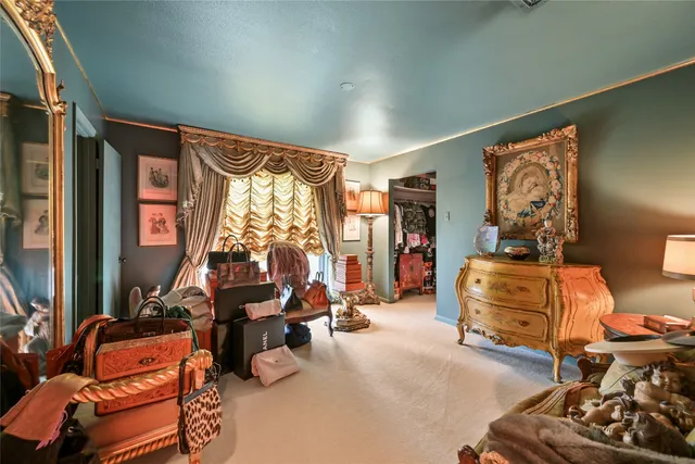 a room with furniture and a large window