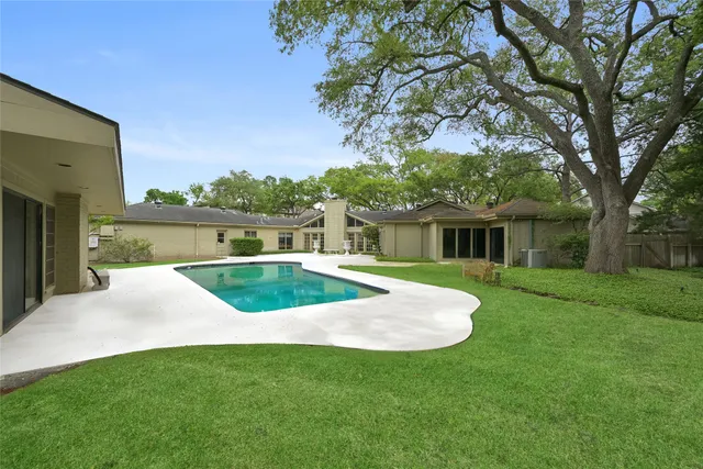 a view of outdoor space yard and swimming pool