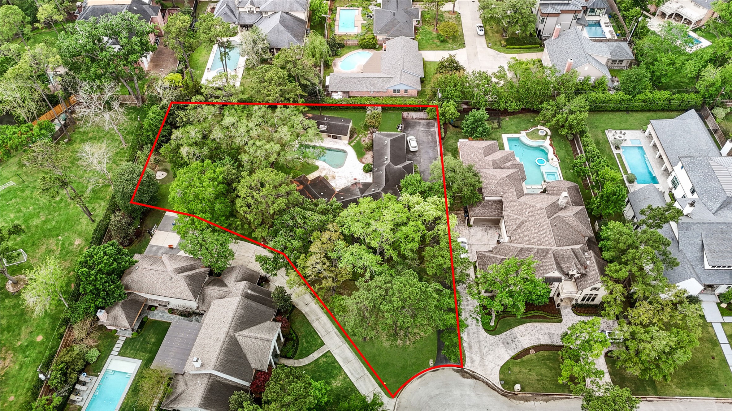 435 Flint Point Drive Piney Point Village, TX 77024 - Photo 32 of 32 an aerial view of a house with a yard and garden