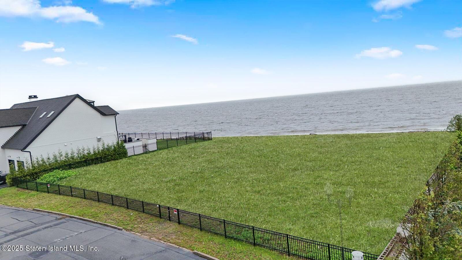 140 Nicolosi Drive Staten Island, NY 10312 - Photo 5 of 7 a view of a back yard