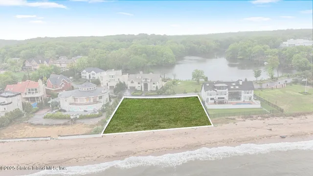 a view of a room with a hard wood floor