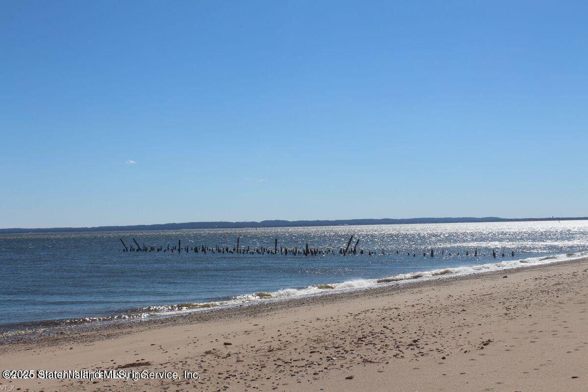 140 Nicolosi Drive Staten Island, NY 10312 - Photo 7 of 7 a view of a room with a hard wood floor