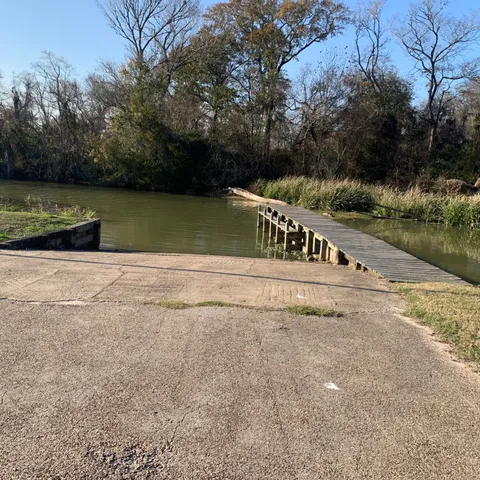 a view of a river and a lake in the background
