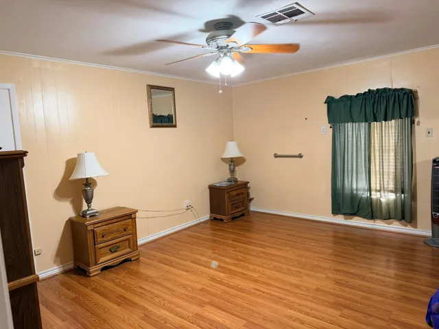 a view of a livingroom with a workspace