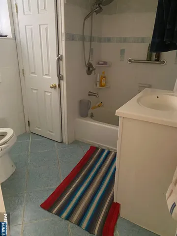 a bathroom with a sink and a toilet