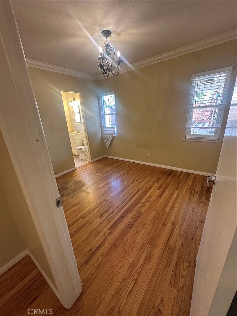7918 Kyle Street Sunland, CA 91040 - Photo 6 of 18 a view of livingroom with hardwood floor and window