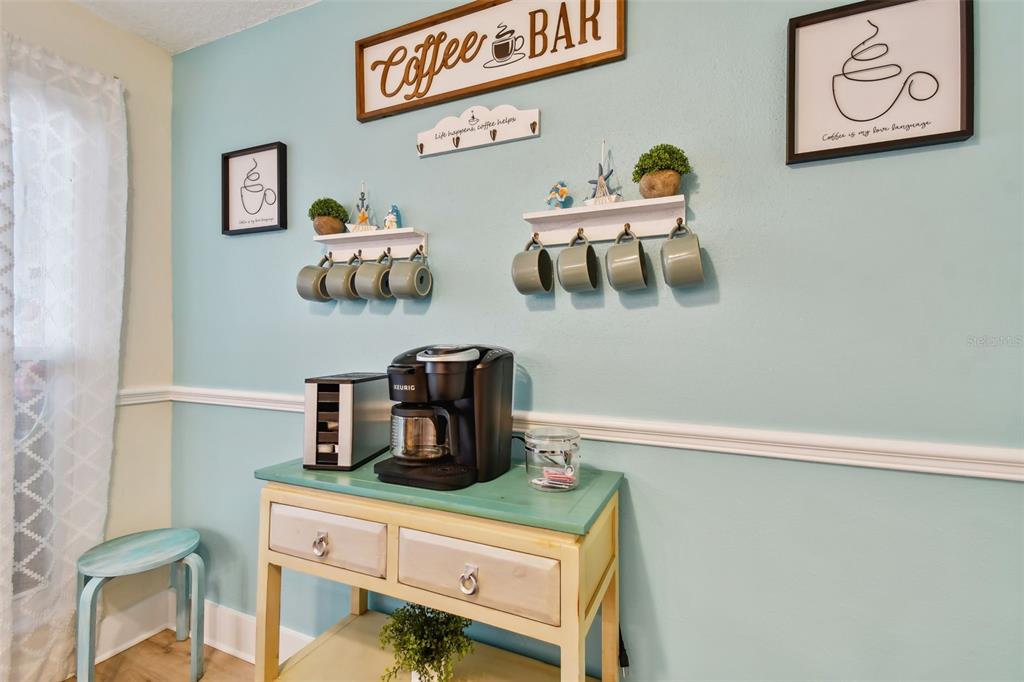 315 Medallion Boulevard, Unit E Madeira Beach, FL 33708 - Photo 21 of 78 a room with a desk and chair