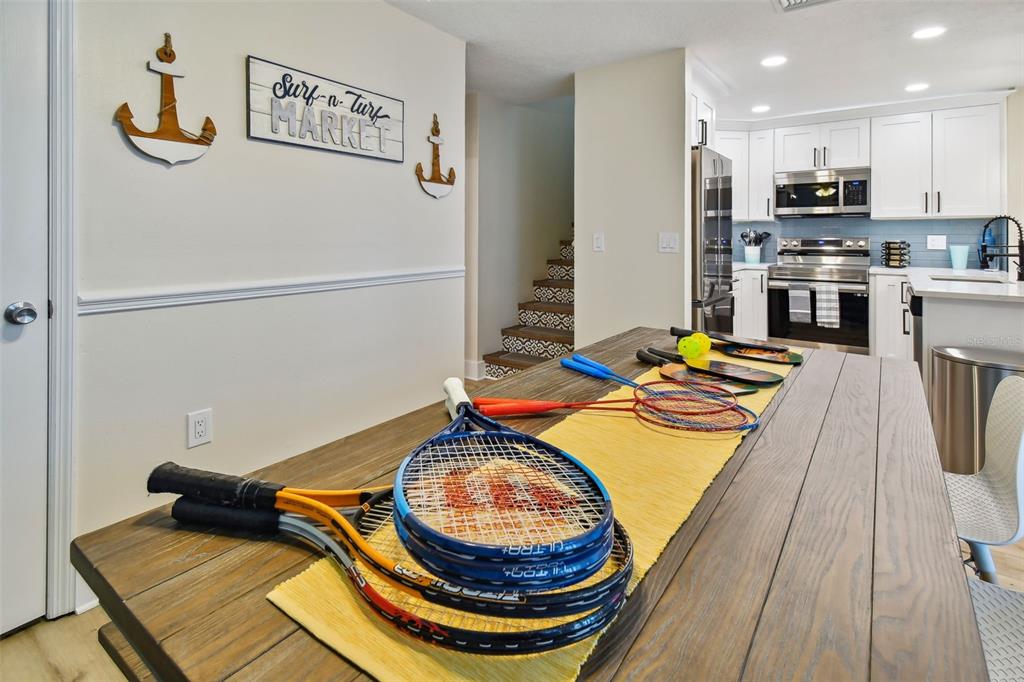 315 Medallion Boulevard, Unit E Madeira Beach, FL 33708 - Photo 30 of 78 a room with stainless steel appliances furniture and kitchen view