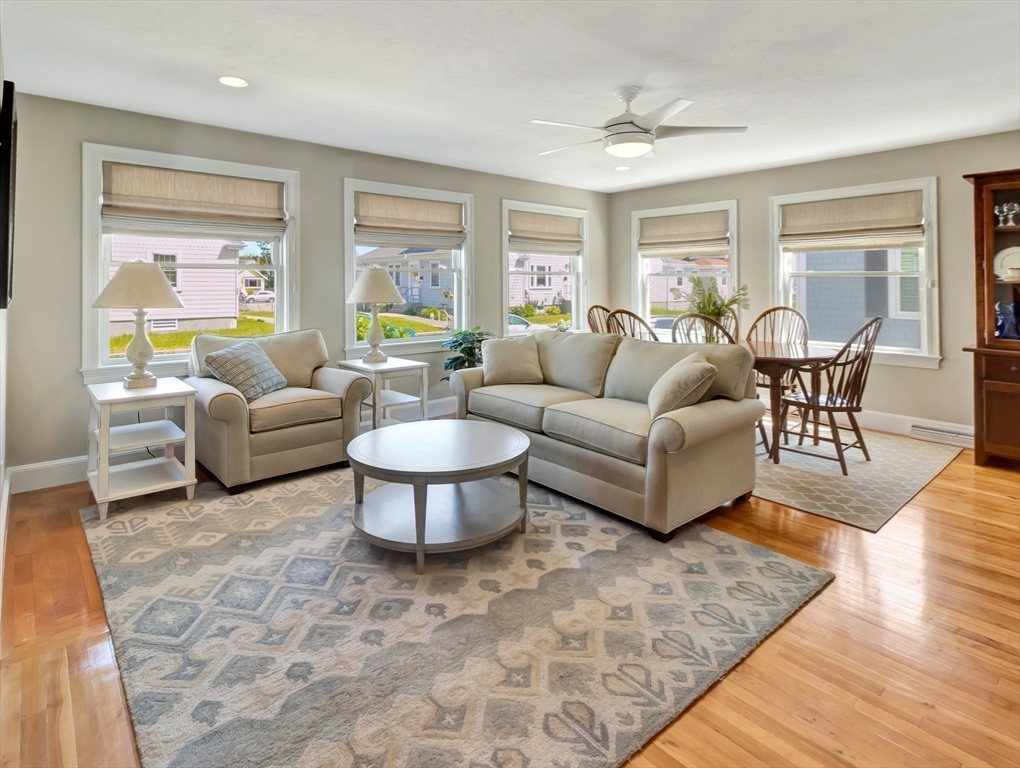 26 C Street Hull, MA 02045 - Photo 11 of 42 a living room with furniture and a large window