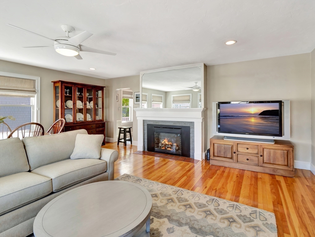 26 C Street Hull, MA 02045 - Photo 13 of 42 a living room with furniture and a fireplace