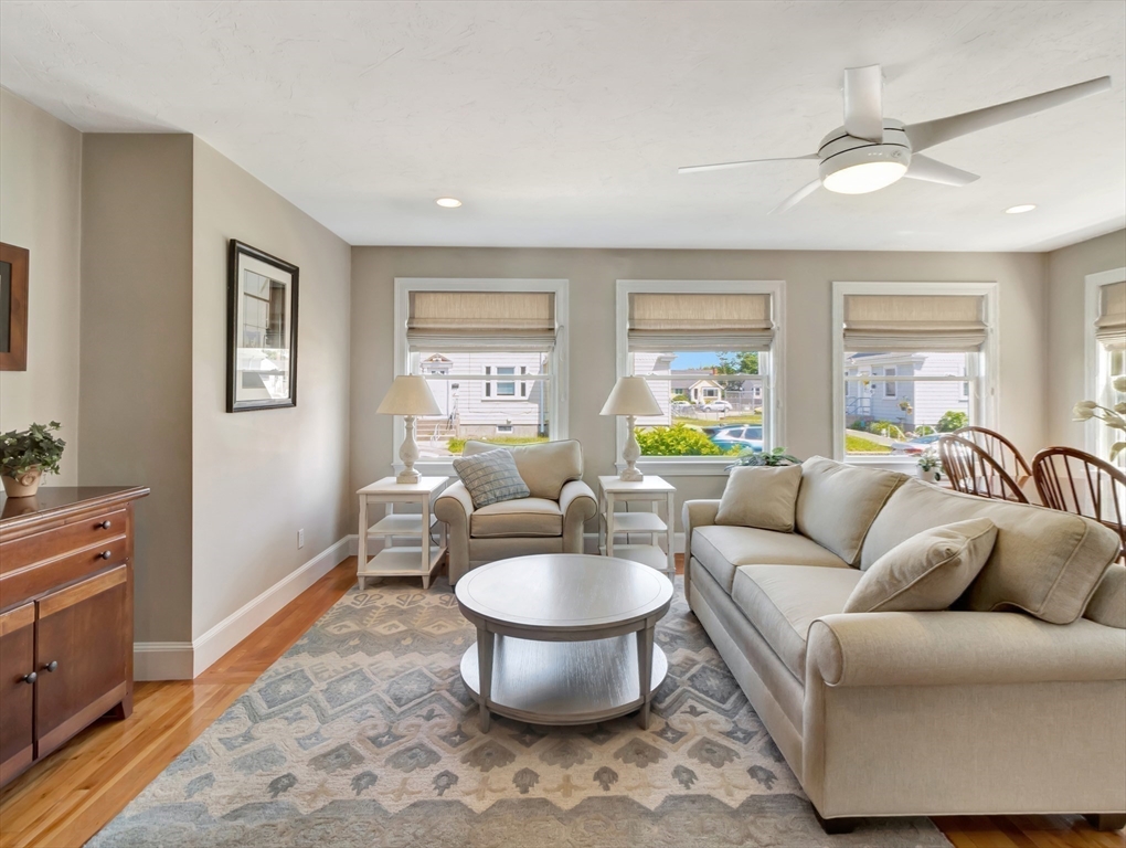 26 C Street Hull, MA 02045 - Photo 14 of 42 a living room with furniture and a large window