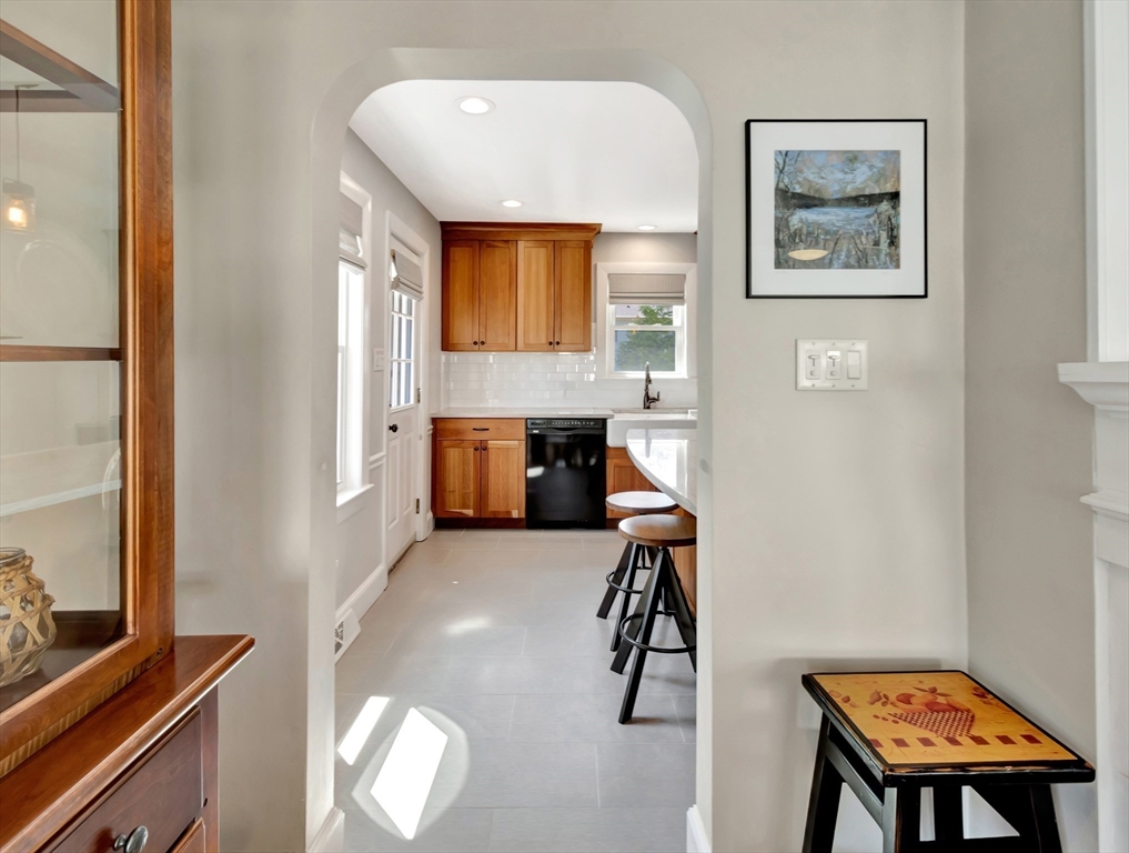 26 C Street Hull, MA 02045 - Photo 18 of 42 a view of a workspace with furniture and a window