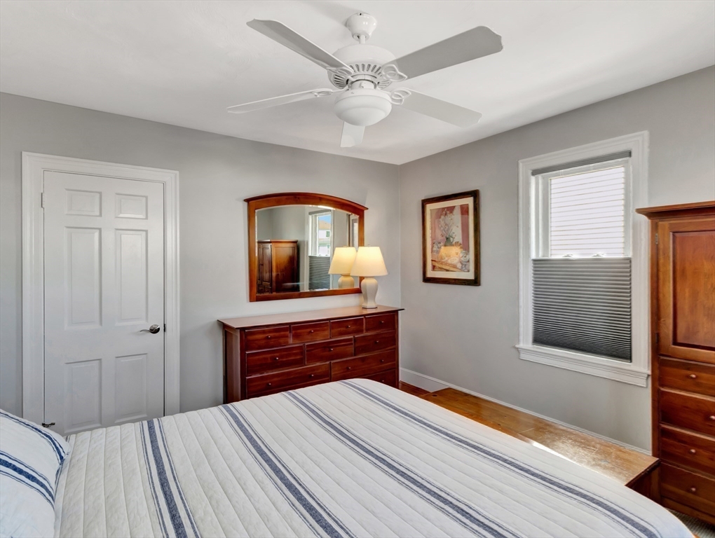 26 C Street Hull, MA 02045 - Photo 25 of 42 a bedroom with a bed and a dresser