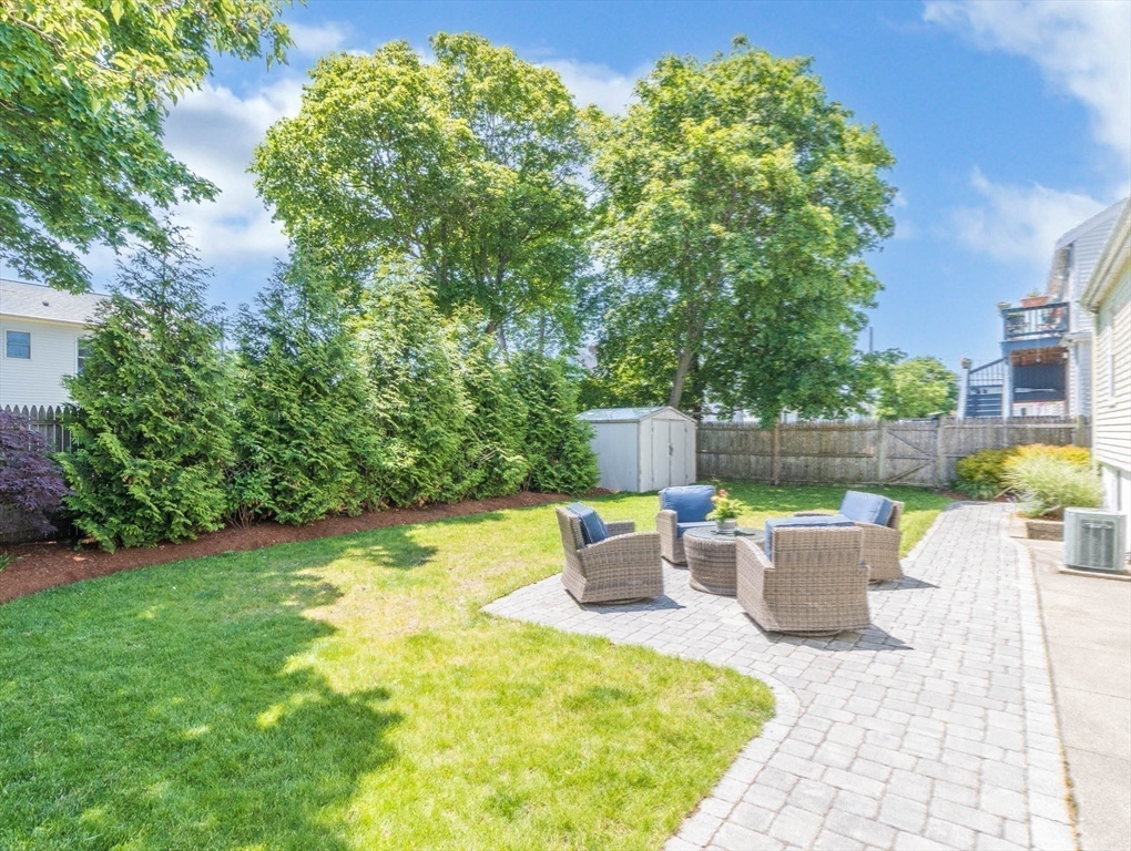 26 C Street Hull, MA 02045 - Photo 39 of 42 a view of a backyard with sitting area