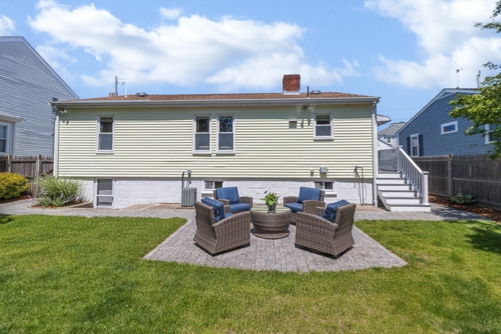26 C Street Hull, MA 02045 - Photo 40 of 42 a view of a house with backyard and porch