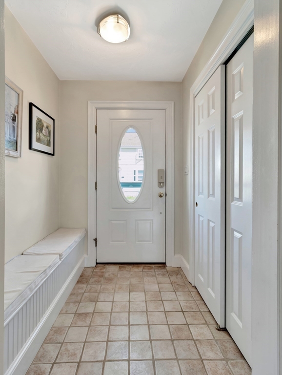 26 C Street Hull, MA 02045 - Photo 8 of 42 a view of a bathroom with a tub and shower