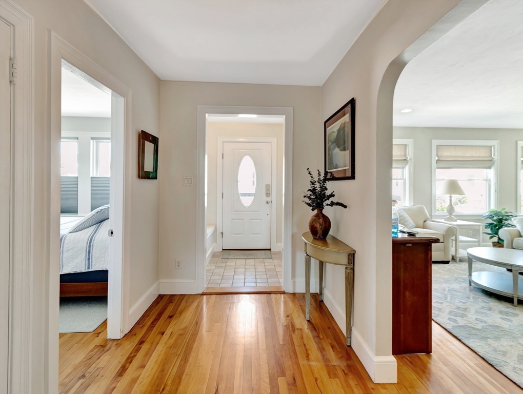 26 C Street Hull, MA 02045 - Photo 9 of 42 a view of a living room and hardwood floor
