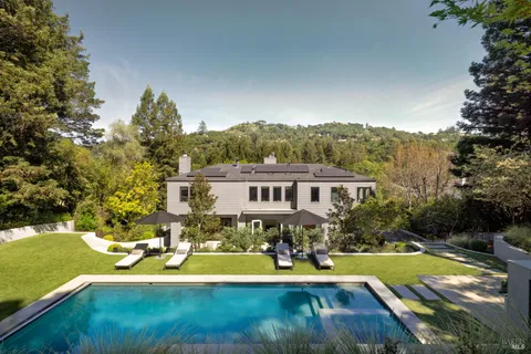 a view of a house with swimming pool
