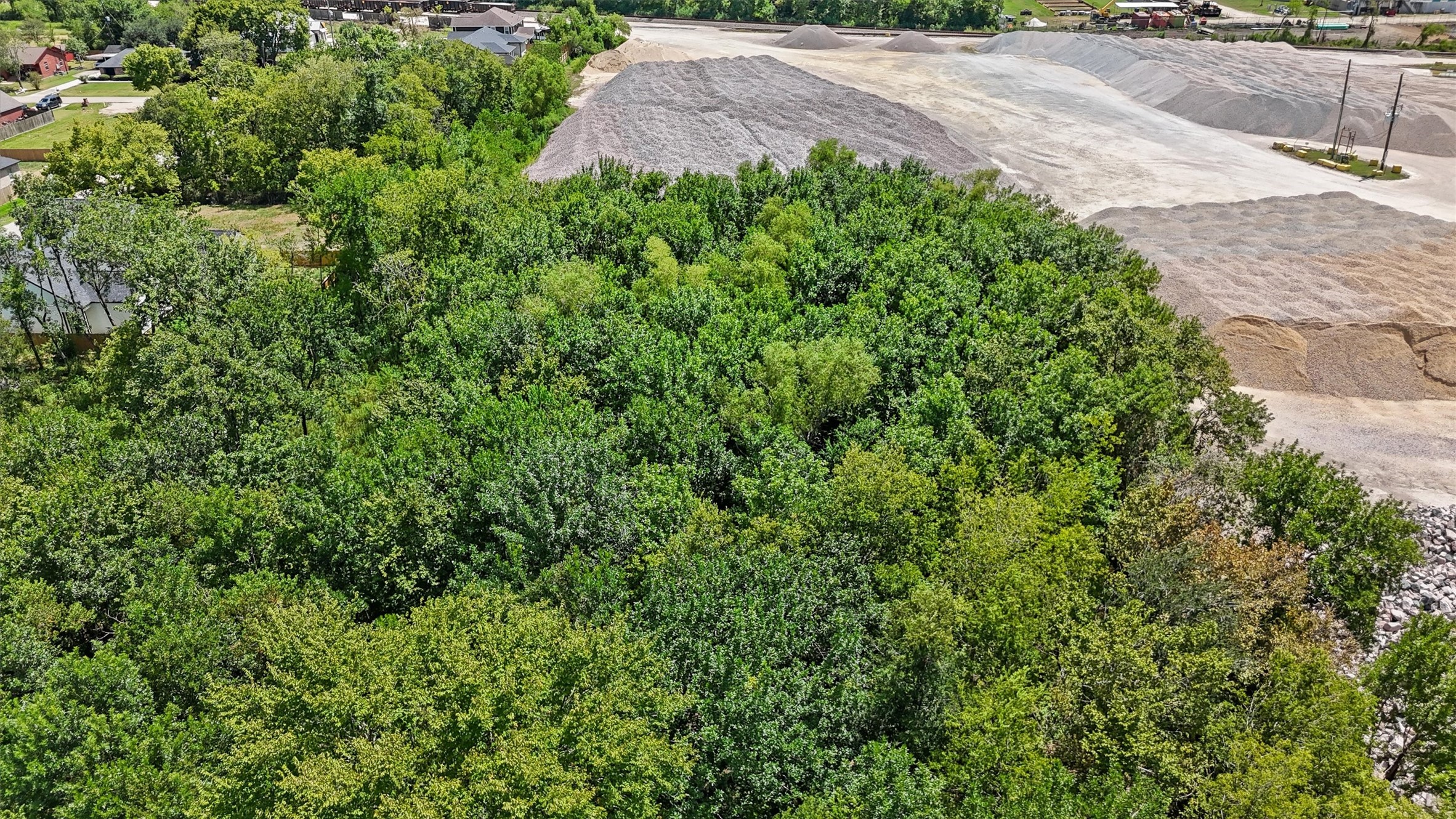 0 Pinedale Avenue Rosharon, TX 77583 - Photo 8 of 19 an aerial view of a house with a yard and garage