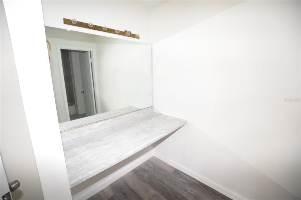 904 Sumter Street Leesburg, FL 34748 - Photo 22 of 27 a view of wooden floor