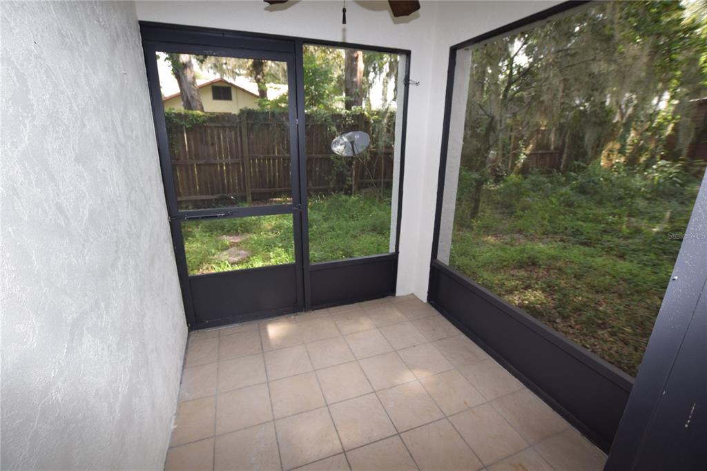 904 Sumter Street Leesburg, FL 34748 - Photo 5 of 27 a view of a garden from a window