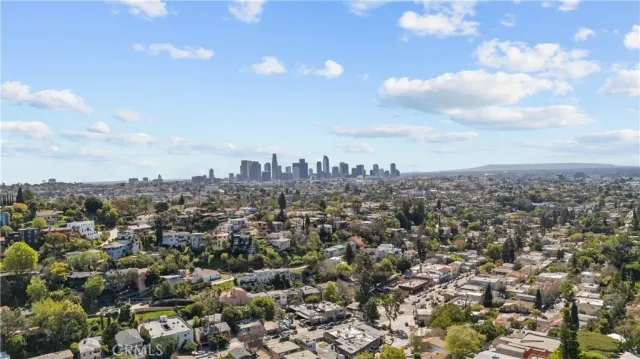 a view of a city with mountains in the background