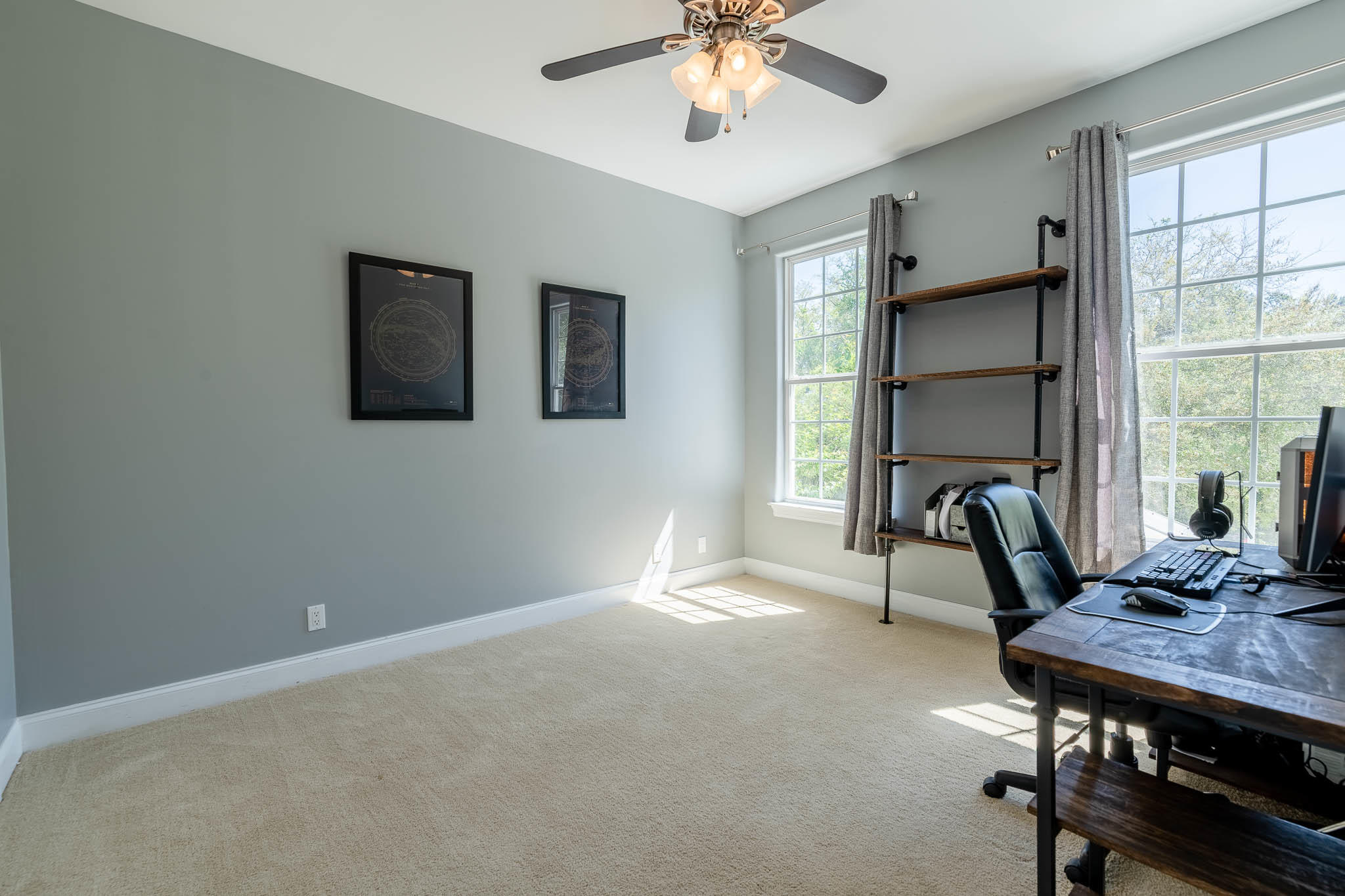 2275 Mack Bayou Road Santa Rosa Beach, FL 32459 - Photo 13 of 20 a view of a workspace with furniture and a window