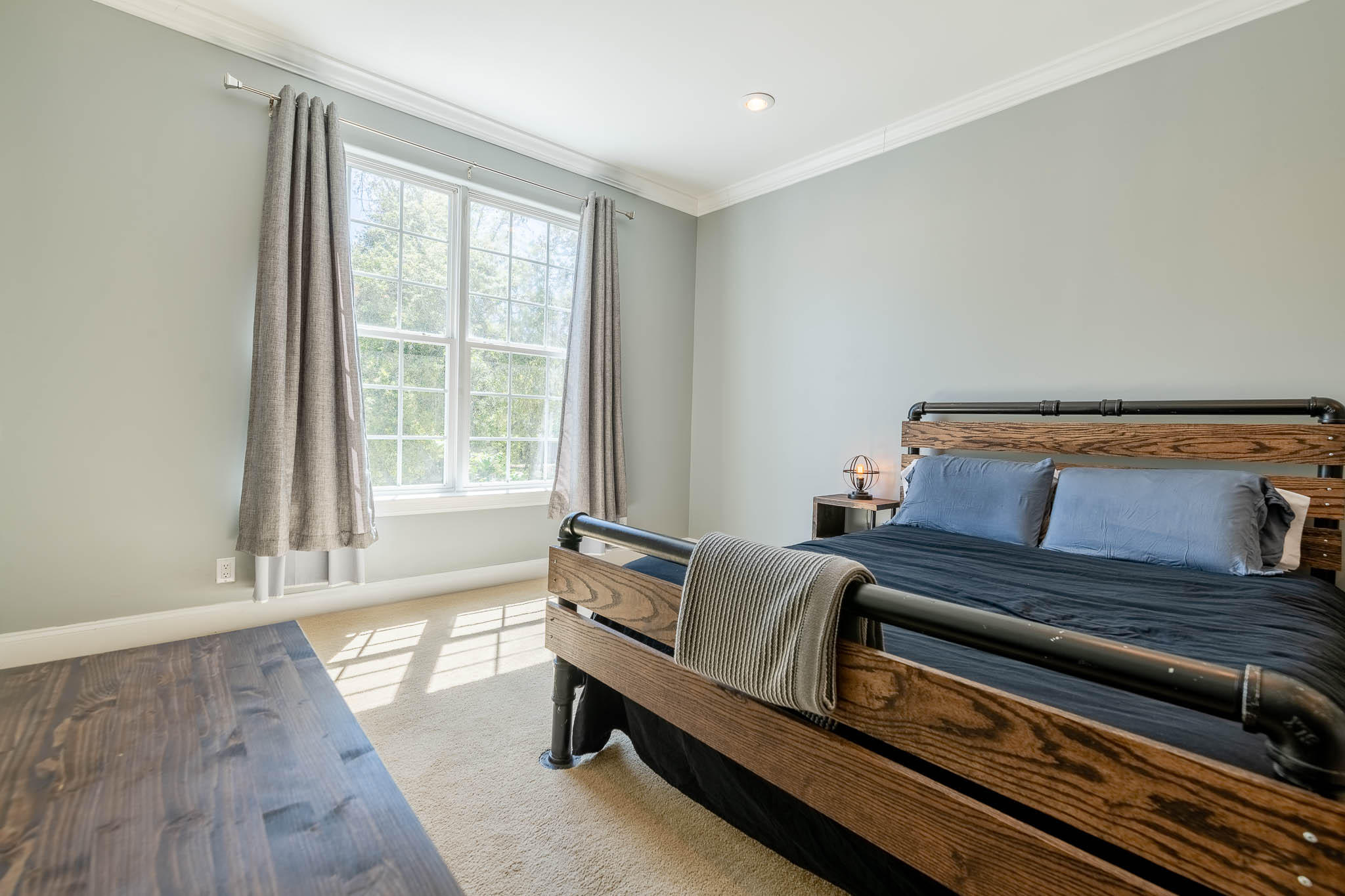 2275 Mack Bayou Road Santa Rosa Beach, FL 32459 - Photo 15 of 20 a bedroom with furniture and wooden floor