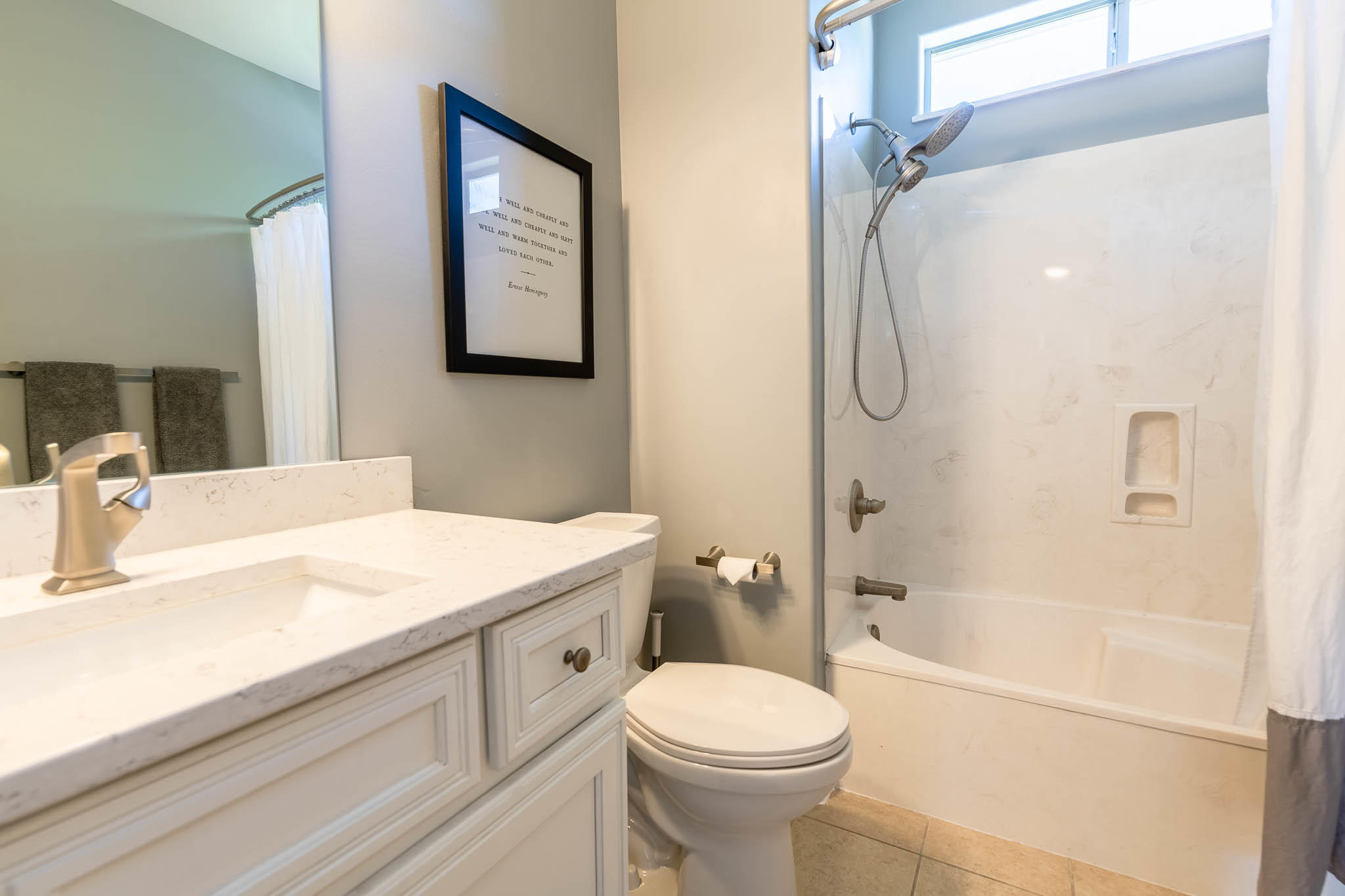 2275 Mack Bayou Road Santa Rosa Beach, FL 32459 - Photo 18 of 20 a bathroom with a sink a toilet and shower