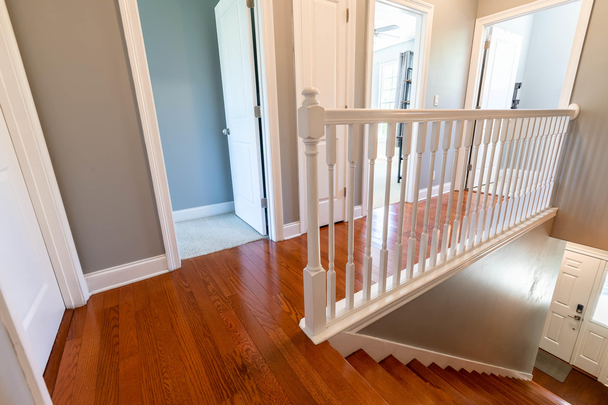 2275 Mack Bayou Road Santa Rosa Beach, FL 32459 - Photo 19 of 20 a view of a hallway with wooden floor