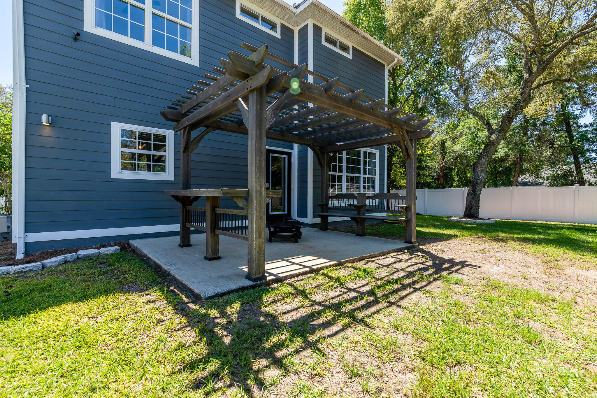 2275 Mack Bayou Road Santa Rosa Beach, FL 32459 - Photo 20 of 20 a view of a house with backyard