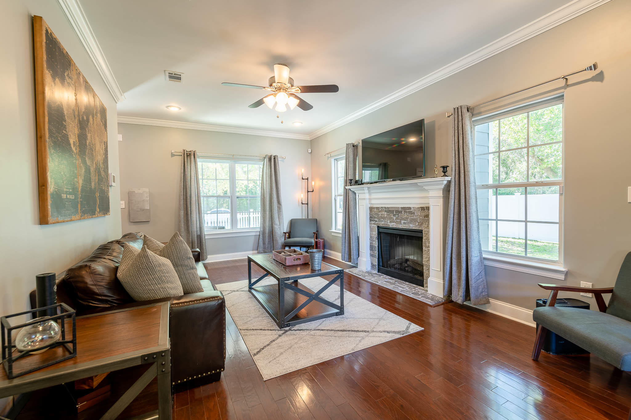 2275 Mack Bayou Road Santa Rosa Beach, FL 32459 - Photo 3 of 20 a living room with furniture fireplace and flat screen tv