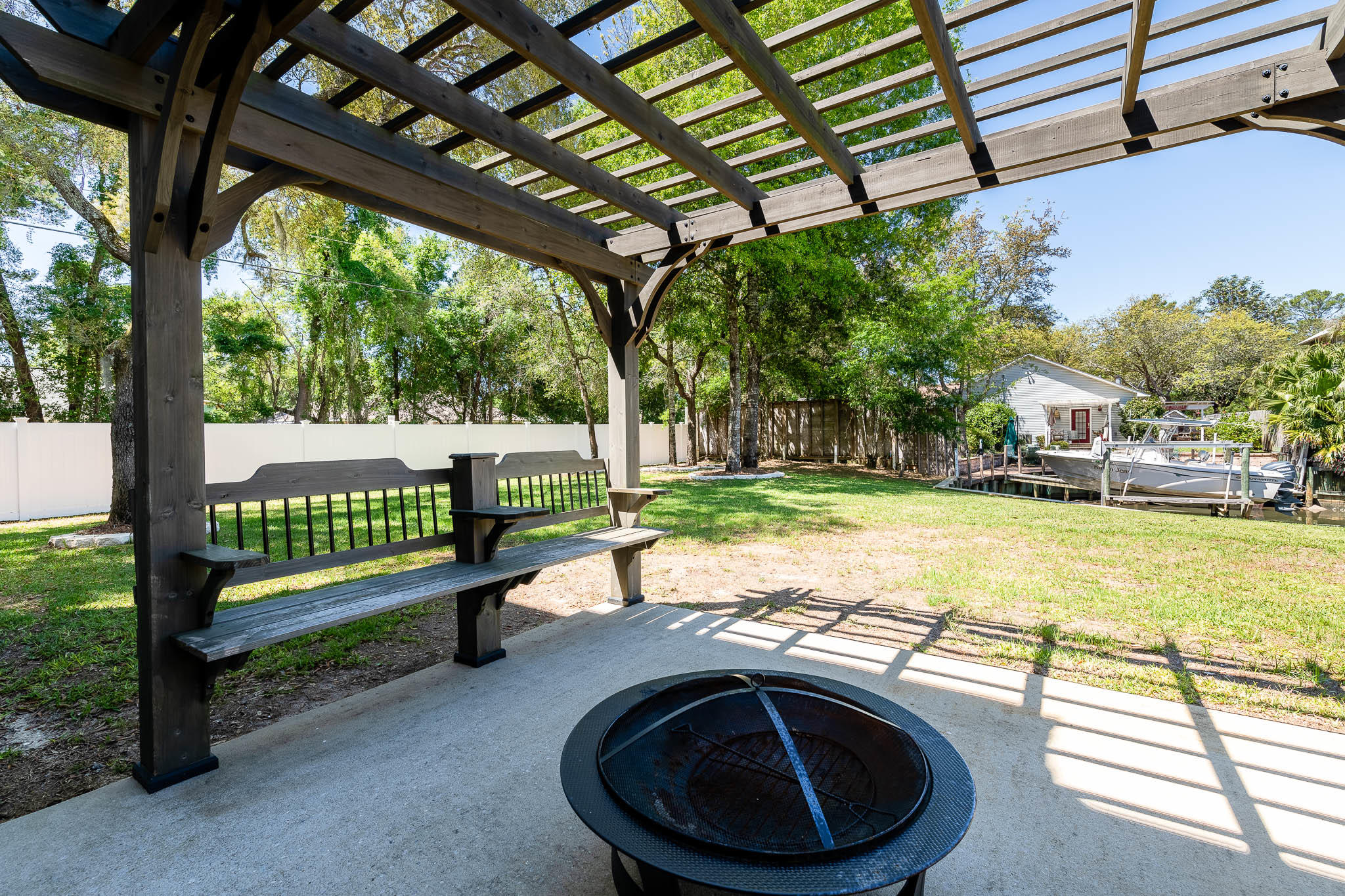 2275 Mack Bayou Road Santa Rosa Beach, FL 32459 - Photo 5 of 20 a view of swimming pool with garden and deck