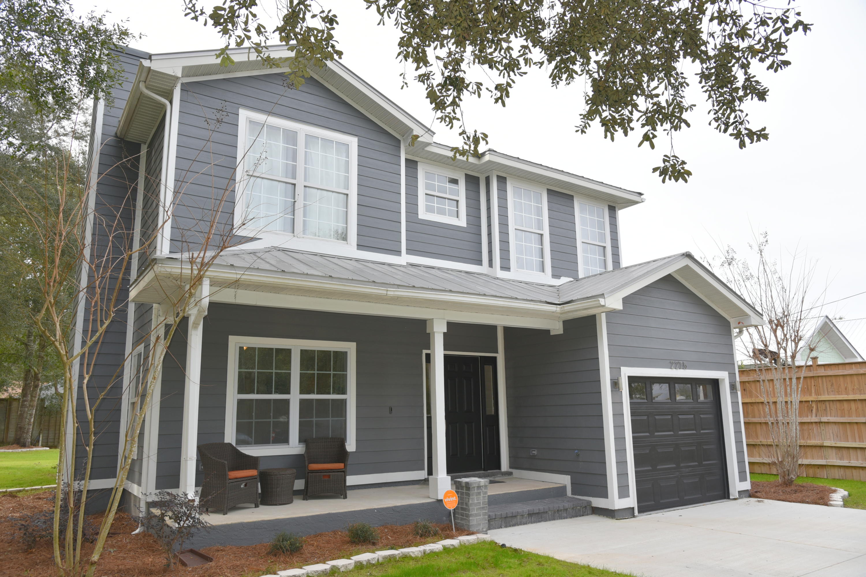 2275 Mack Bayou Road Santa Rosa Beach, FL 32459 - Photo 7 of 20 front view of a house with a yard