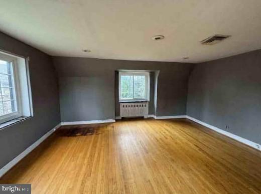 2820 Hillcrest Road Drexel Hill, PA 19026 - Photo 8 of 9 a view of empty room with wooden floor and fan