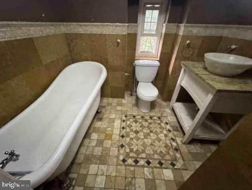 2820 Hillcrest Road Drexel Hill, PA 19026 - Photo 9 of 9 a bathroom with a sink and a mirror