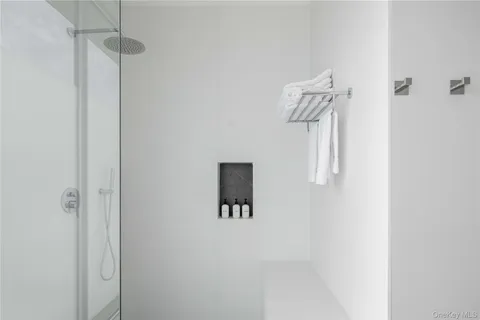 a view of a hallway with closet