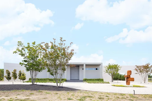 a house with trees in the background