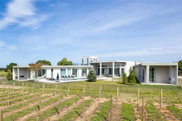 a view of a house with swimming pool