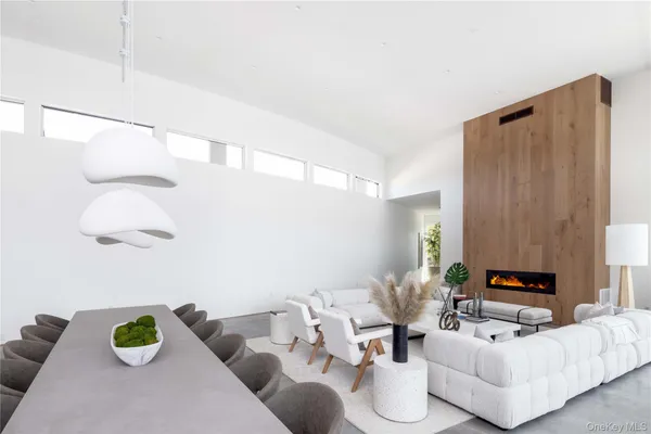 a living room with furniture and white walls