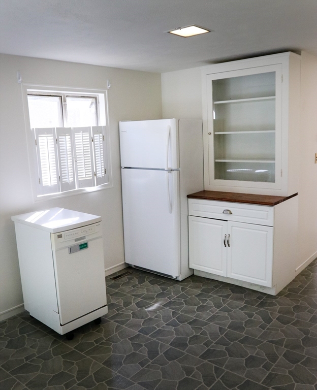 583 Gay Street, Unit A Westwood, MA 02090 - Photo 4 of 14 a utility room with washer and dryer
