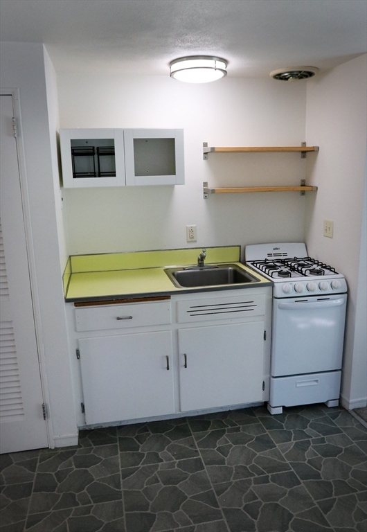 583 Gay Street, Unit A Westwood, MA 02090 - Photo 6 of 14 a utility room with a washer and dryer