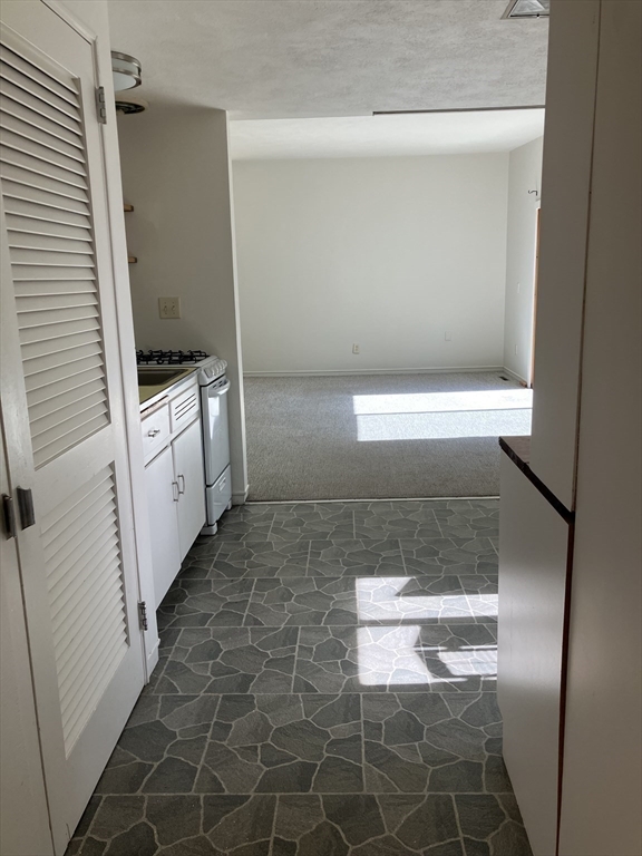 583 Gay Street, Unit A Westwood, MA 02090 - Photo 7 of 14 a bathroom with a shower