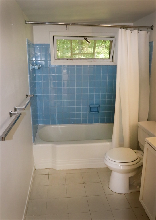 583 Gay Street, Unit A Westwood, MA 02090 - Photo 10 of 14 a bathroom with a bathtub and a toilet