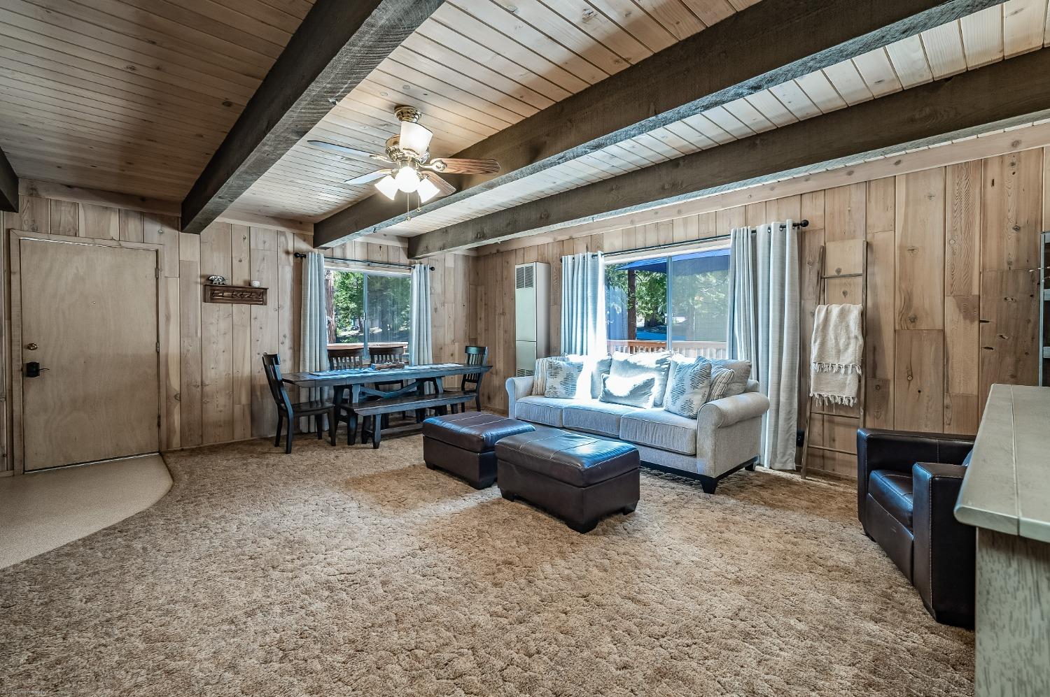 41277 Timber Drive Shaver Lake, CA 93664 - Photo 11 of 24 a living room with furniture and a large window