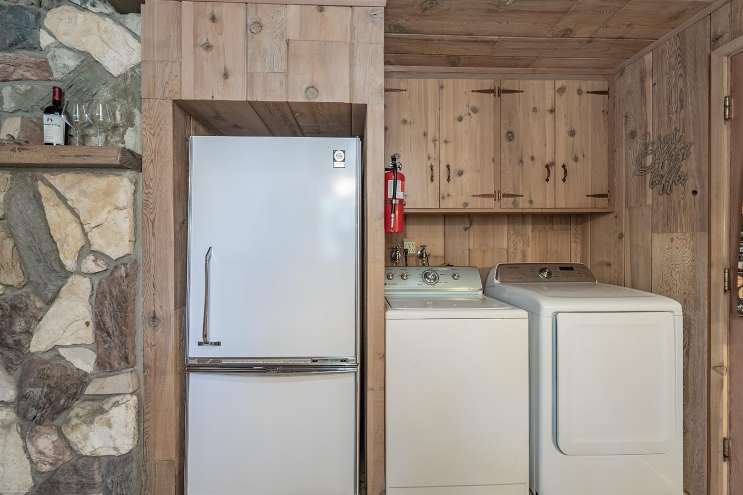 41277 Timber Drive Shaver Lake, CA 93664 - Photo 15 of 24 a utility room with dryer and washer