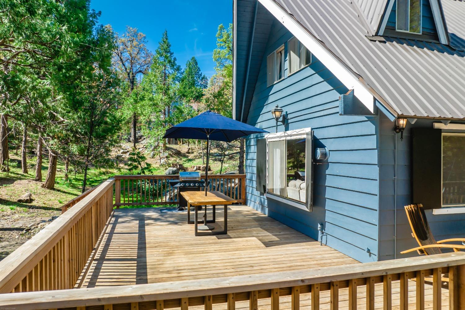 41277 Timber Drive Shaver Lake, CA 93664 - Photo 6 of 24 a house view with a seating space