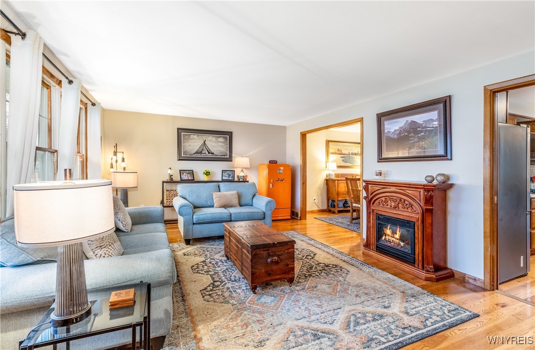 390 Brookshire Road Porter, NY 14174 - Photo 11 of 50 The living room showcases beautiful hardwood floor