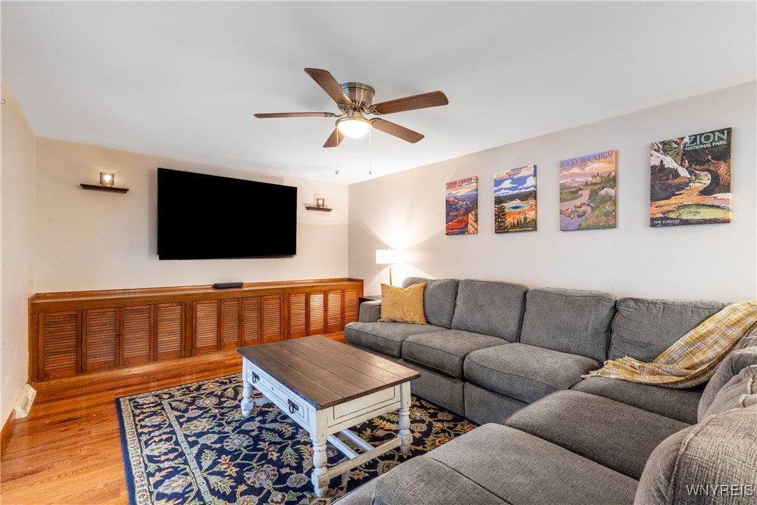 390 Brookshire Road Porter, NY 14174 - Photo 26 of 50 Family room with a custom built-in for storage and