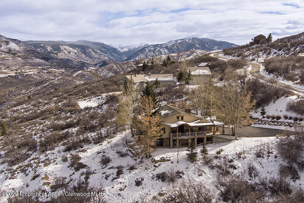 2345 Juniper Hill Road Aspen, CO 81611 - Photo 25 of 26 an aerial view of a houses with a yard